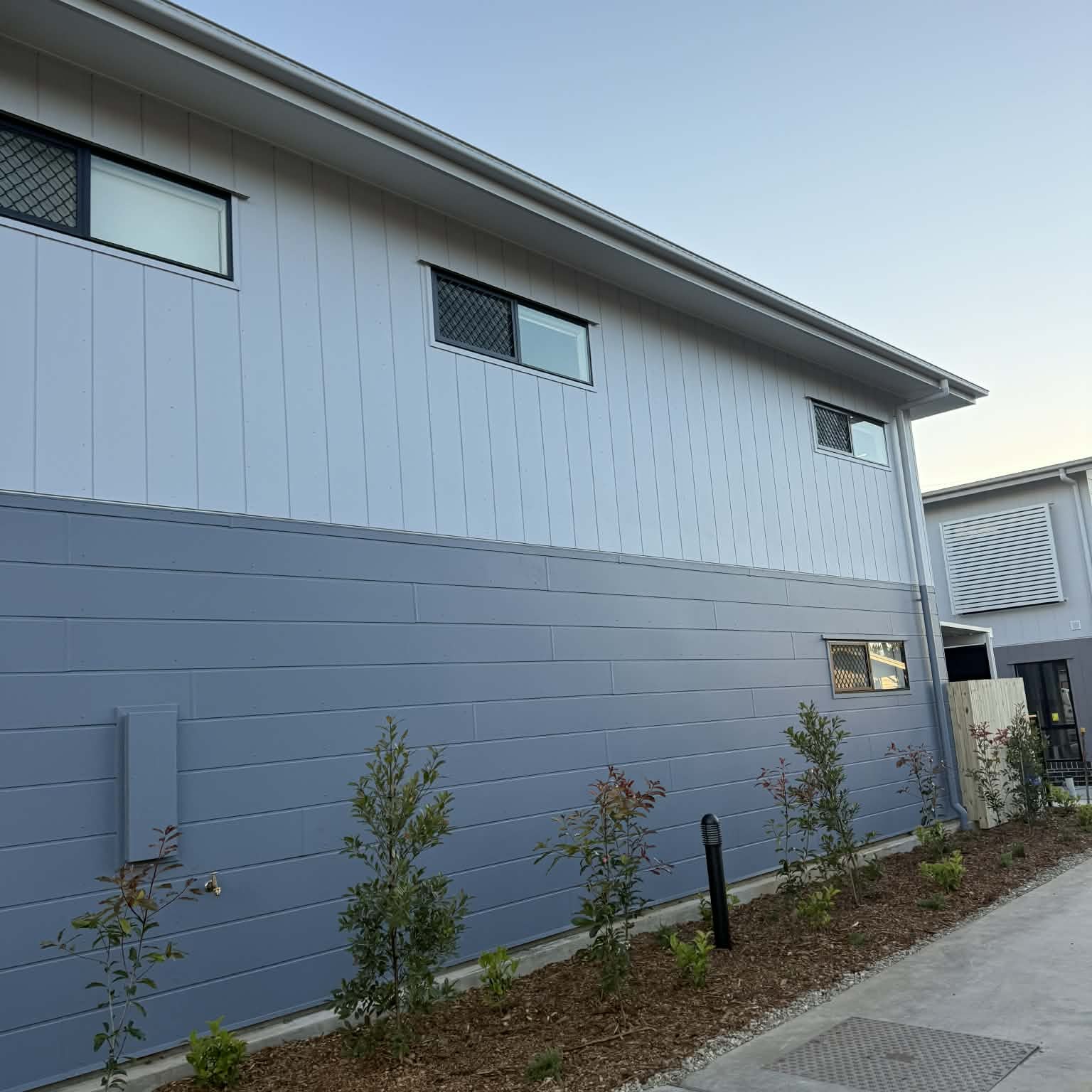 Modern two-tone cladding on a new Brisbane townhouse