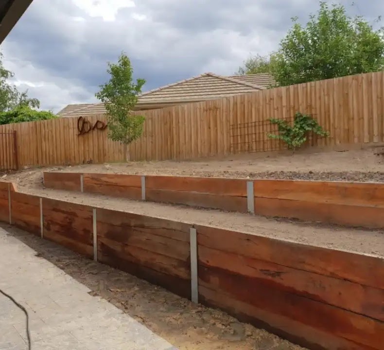 Terraced timber landscaping in a backyard